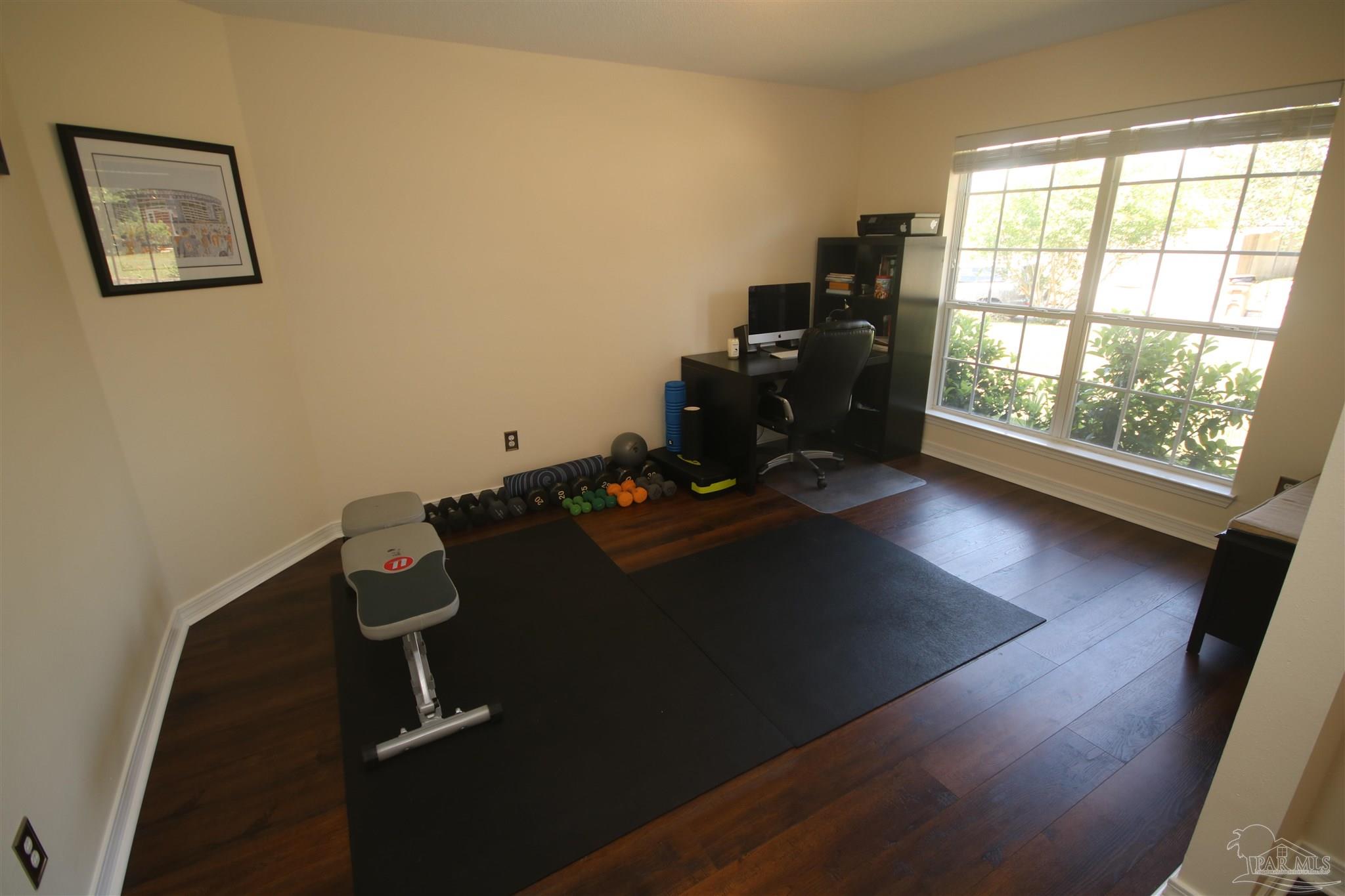 4930 Chads Circle Milton, FL 32571 - Photo 20 of 50 a view of workspace with wooden floor