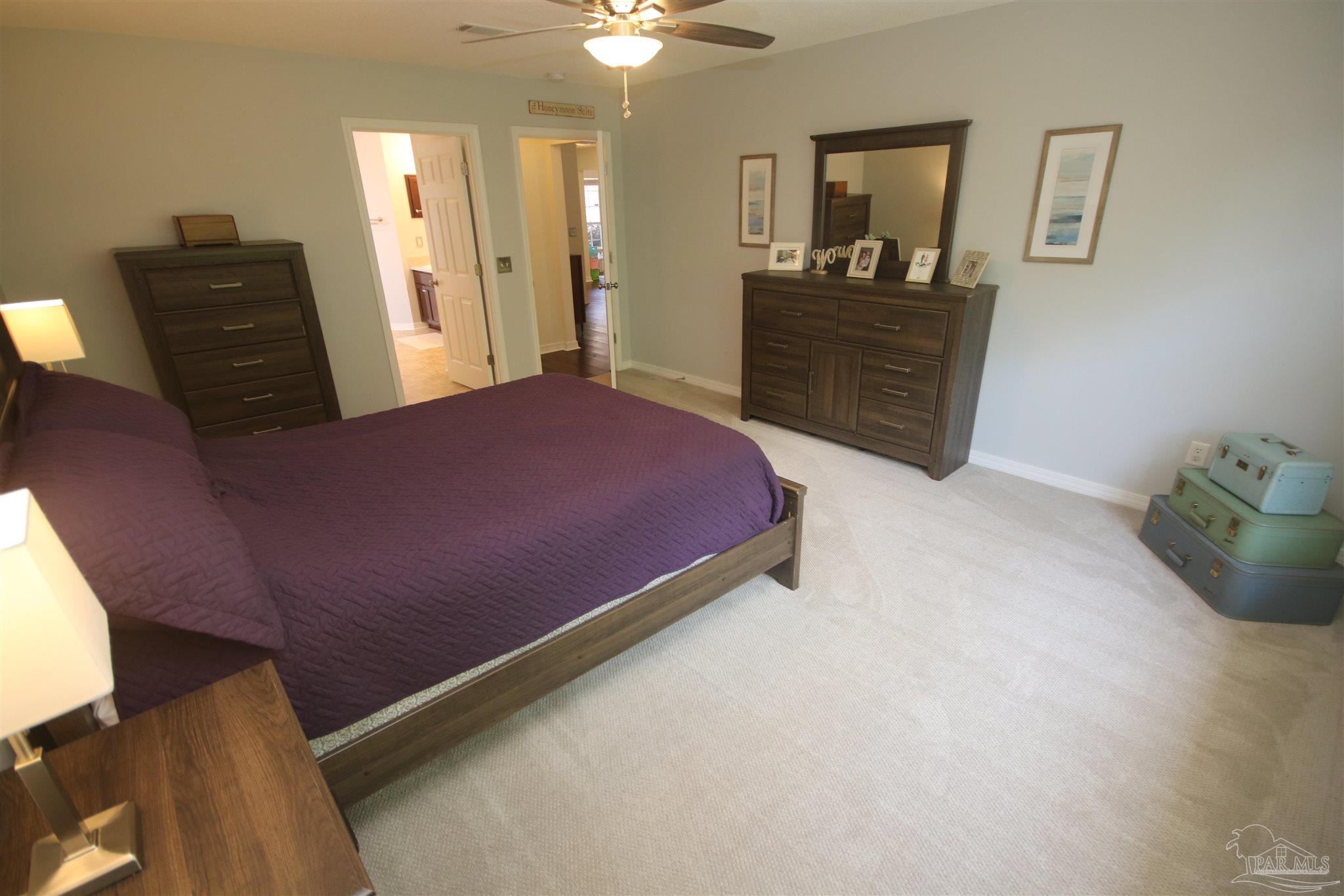 4930 Chads Circle Milton, FL 32571 - Photo 27 of 50 a bedroom with a bed and window