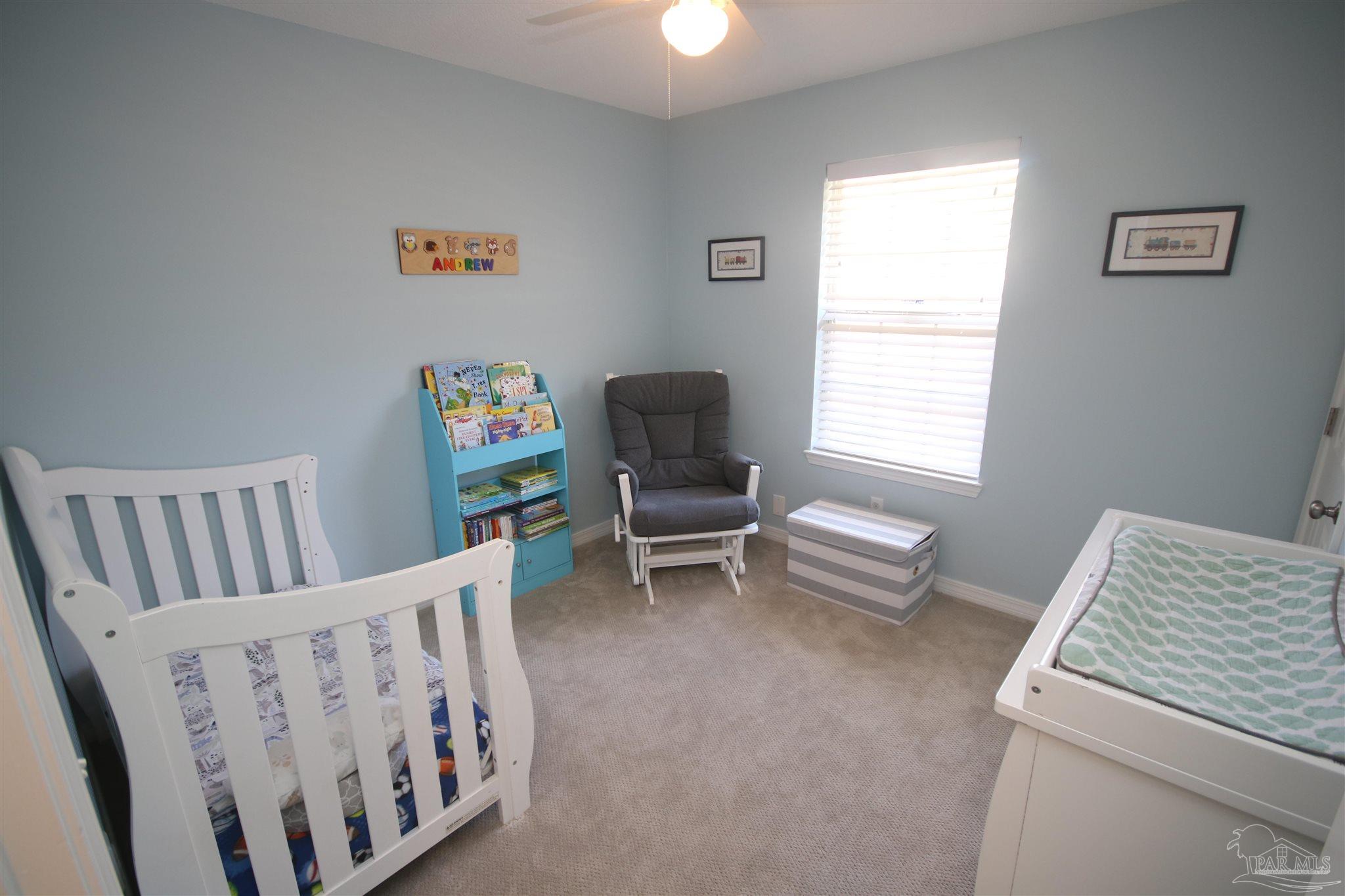 4930 Chads Circle Milton, FL 32571 - Photo 33 of 50 a bedroom with furniture and a window