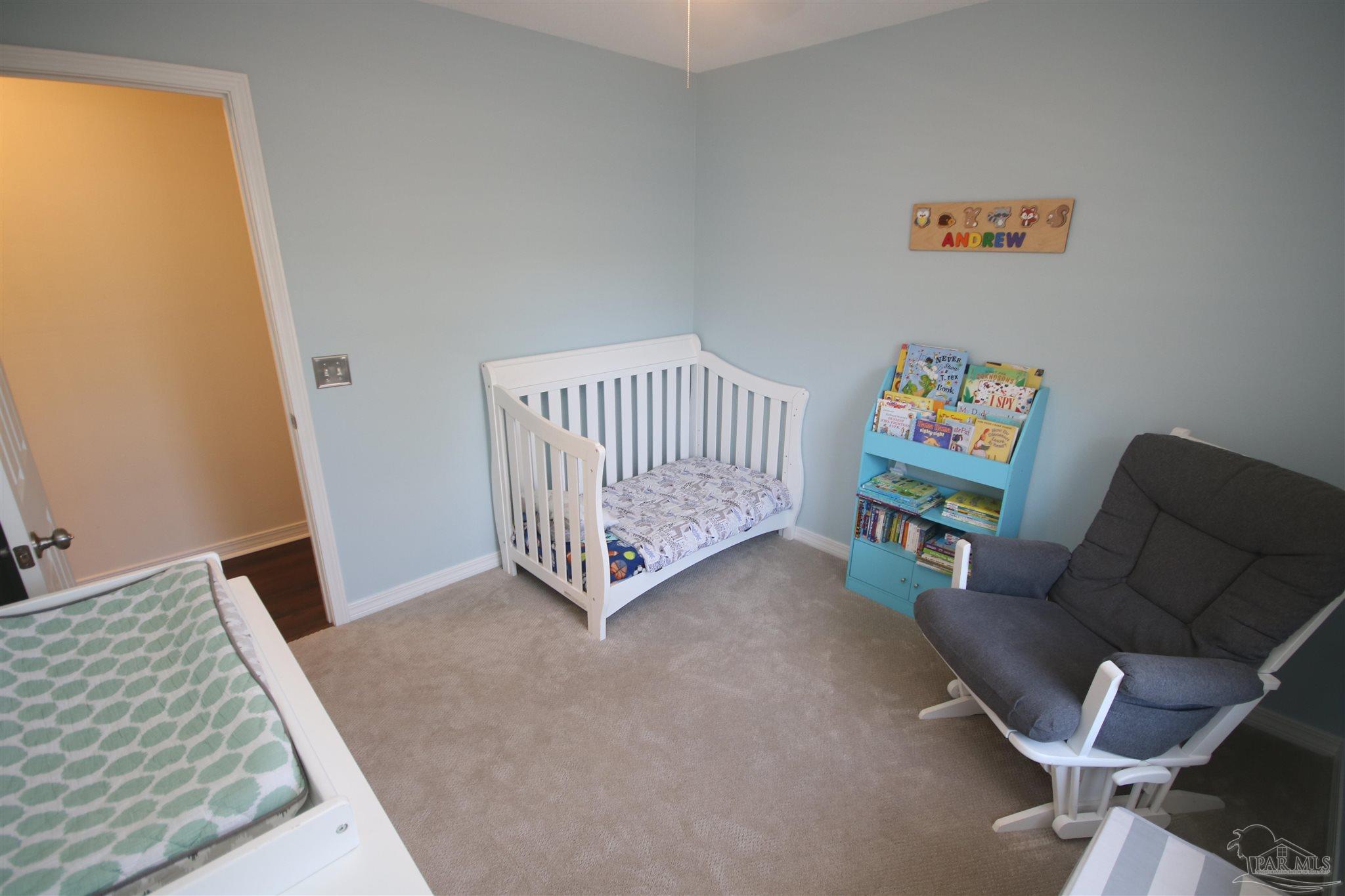 4930 Chads Circle Milton, FL 32571 - Photo 34 of 50 a living room with furniture and a window