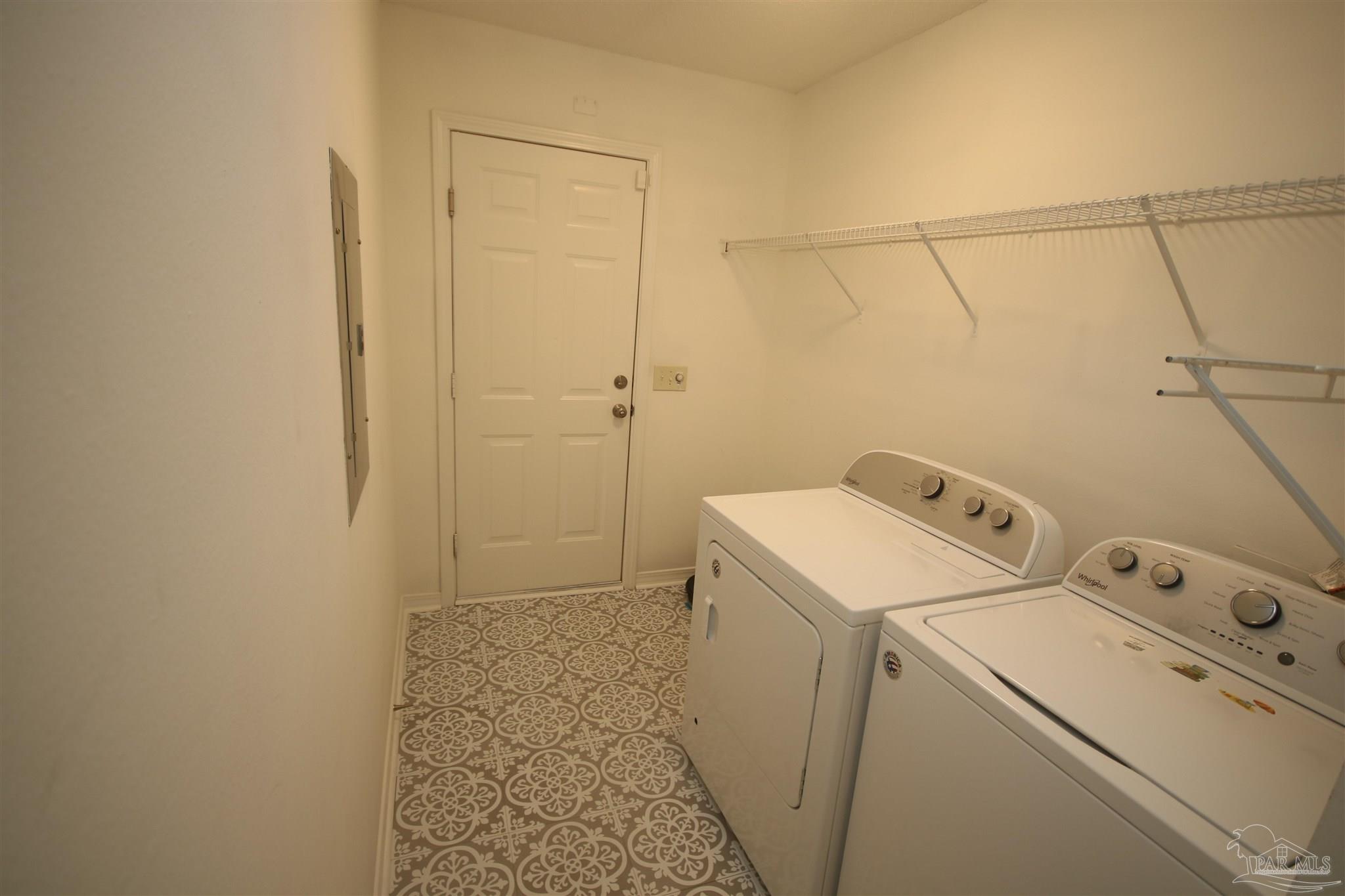 4930 Chads Circle Milton, FL 32571 - Photo 45 of 50 a utility room with dryer and washer