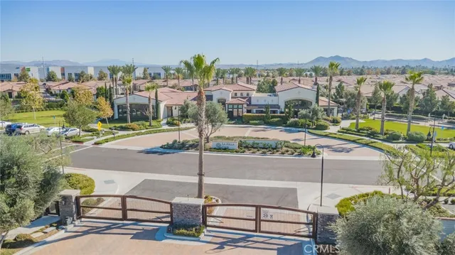 a view of a street with a building in the background