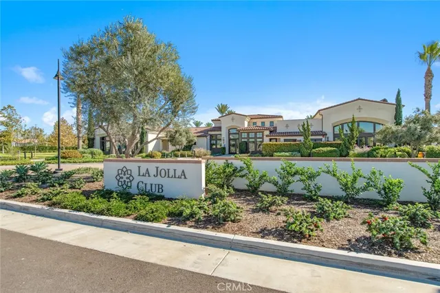 a swimming pool with outdoor seating and yard
