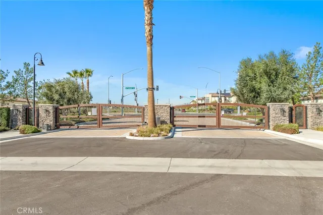 an aerial view of a house with a swimming pool and outdoor seating