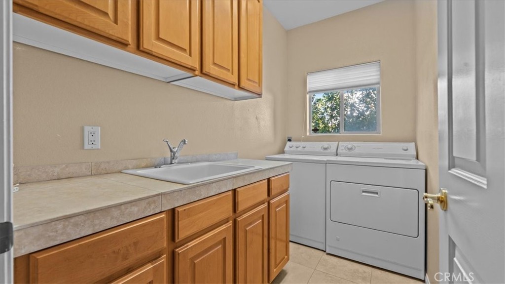 71569 Sahara Road Rancho Mirage, CA 92270 - Photo 29 of 51 Laundry Room with storage