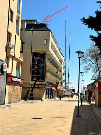 a view of a building with a street