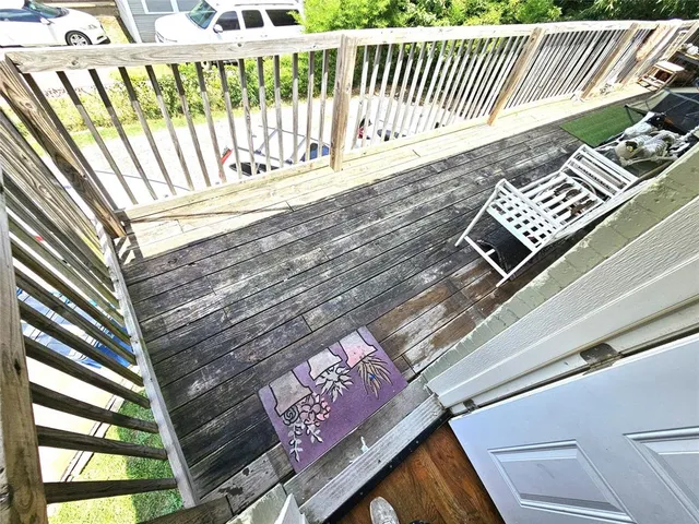 a view of outdoor space with deck and furniture