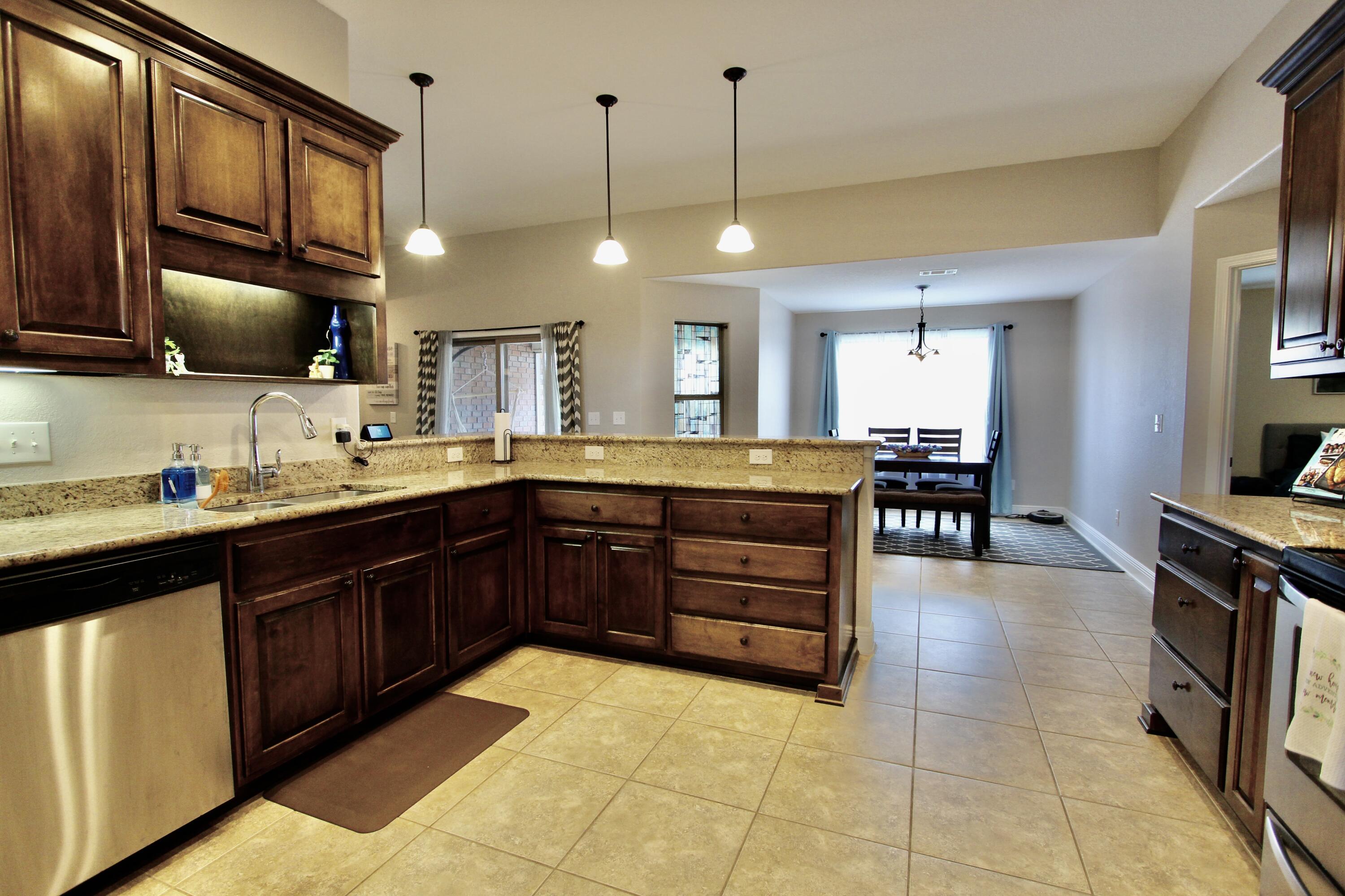 502 Vale Loop Crestview, FL 32536 - Photo 18 of 53 a kitchen with a sink and cabinets