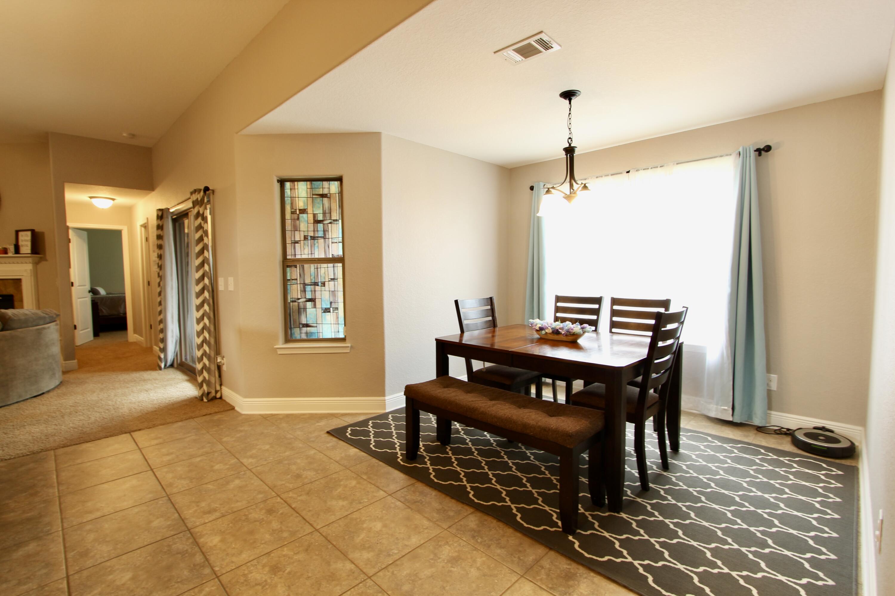 502 Vale Loop Crestview, FL 32536 - Photo 20 of 53 a view of a dining room with furniture