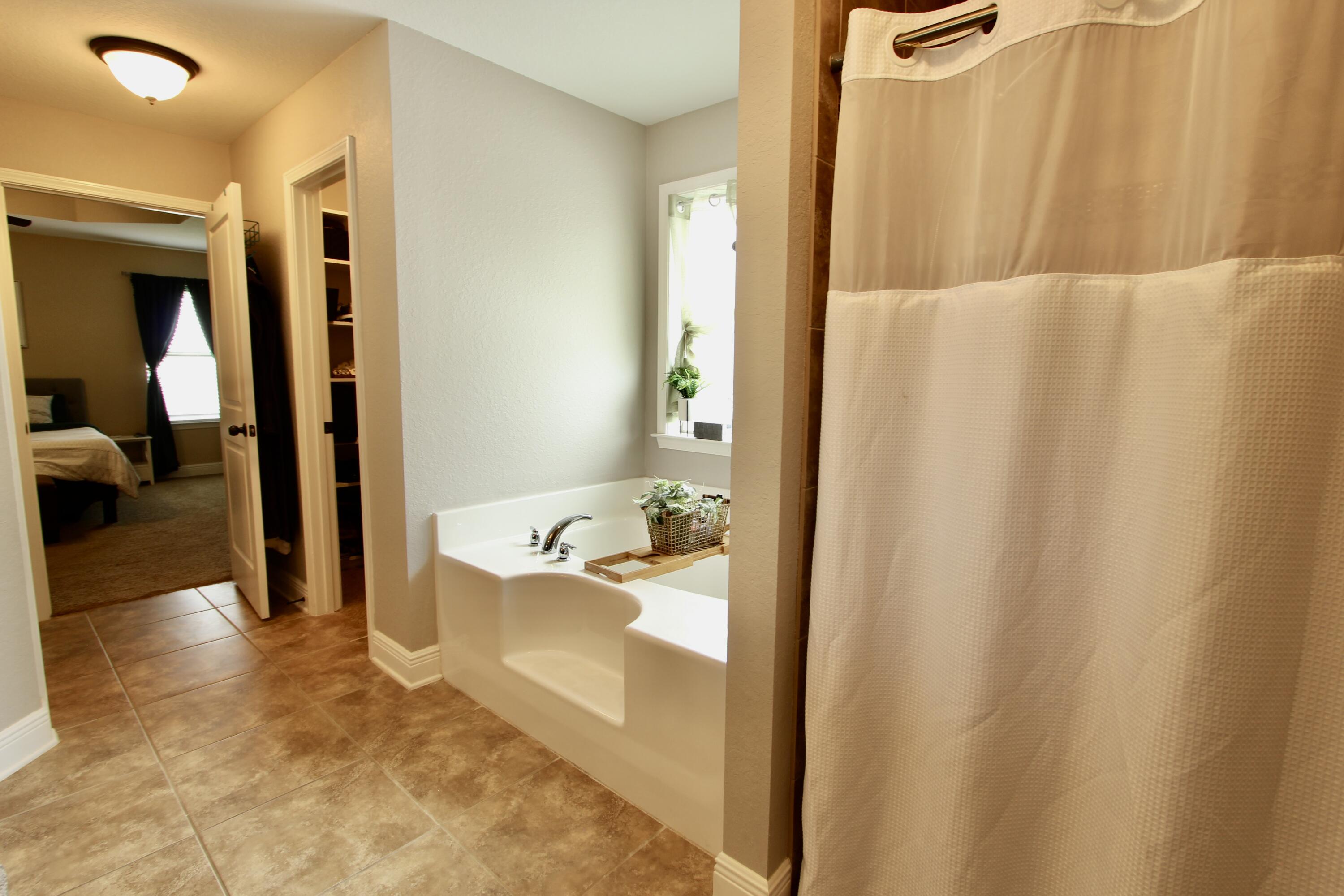 502 Vale Loop Crestview, FL 32536 - Photo 43 of 53 a bathroom with shower and bathtub