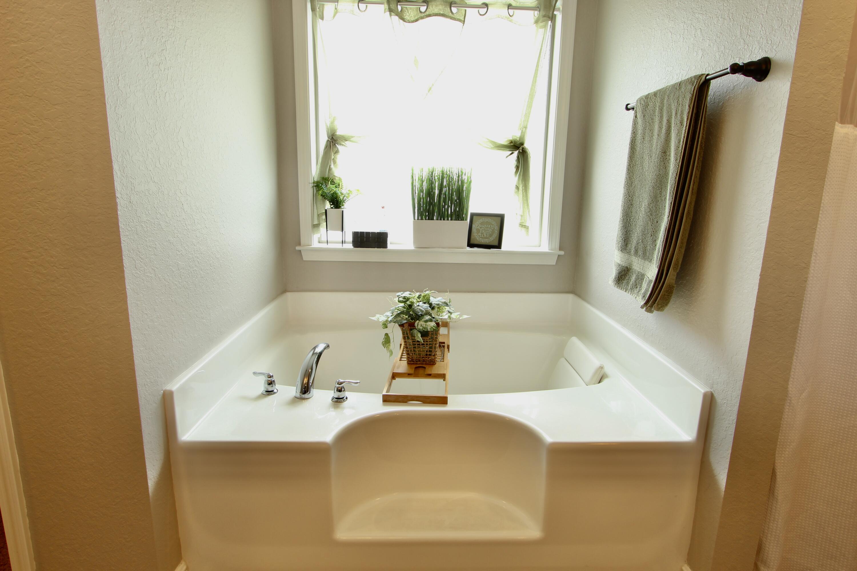 502 Vale Loop Crestview, FL 32536 - Photo 44 of 53 a bath tub sitting next to a bathroom sink