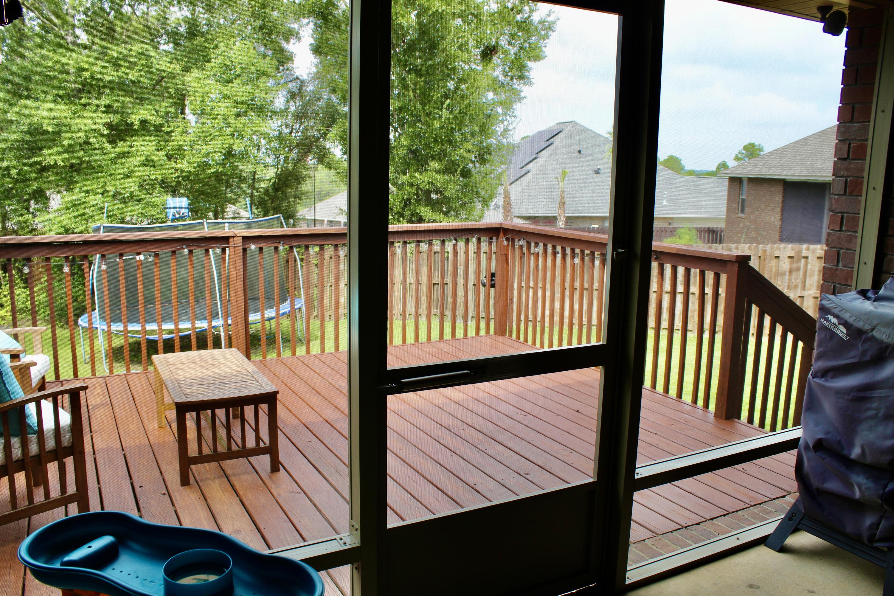502 Vale Loop Crestview, FL 32536 - Photo 46 of 53 a view of a balcony with wooden floor