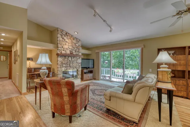 a view of a two chairs in the balcony