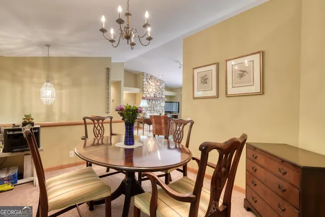 a bathroom with a sink double vanity granite and a mirror