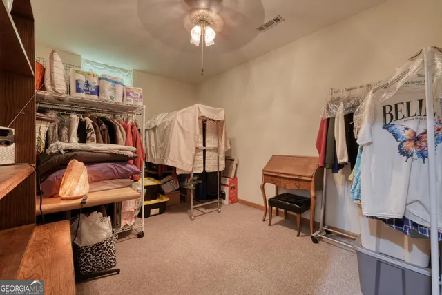 a view of a porch with seating space