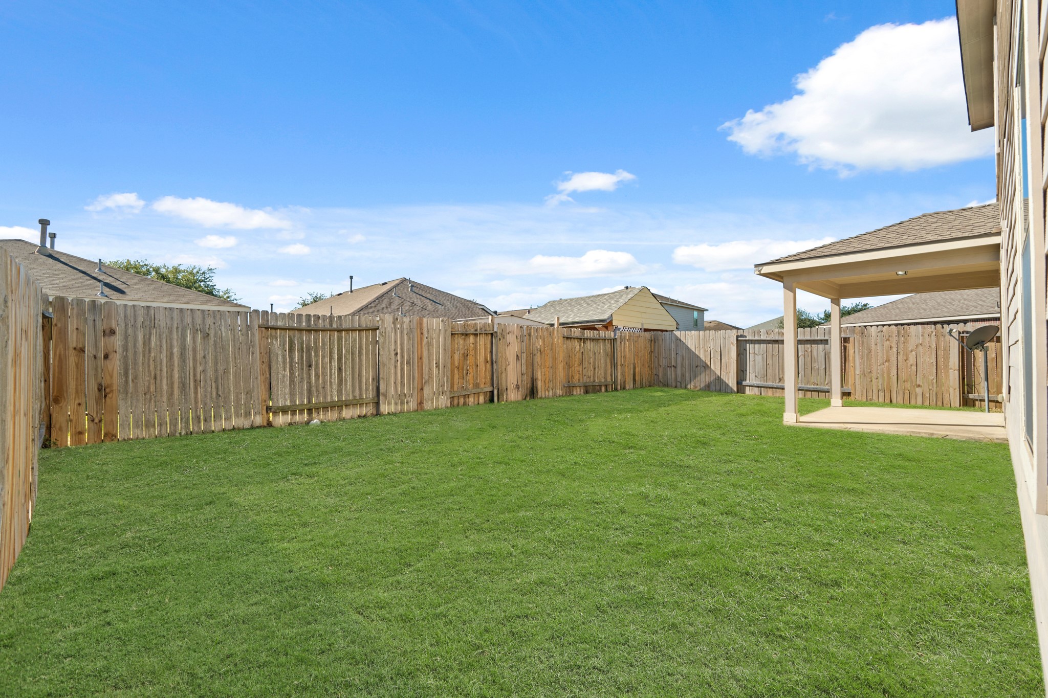 21359 Bandera Ranch Lane Katy, TX 77449 - Photo 17 of 31 a view of a house with backyard and garden