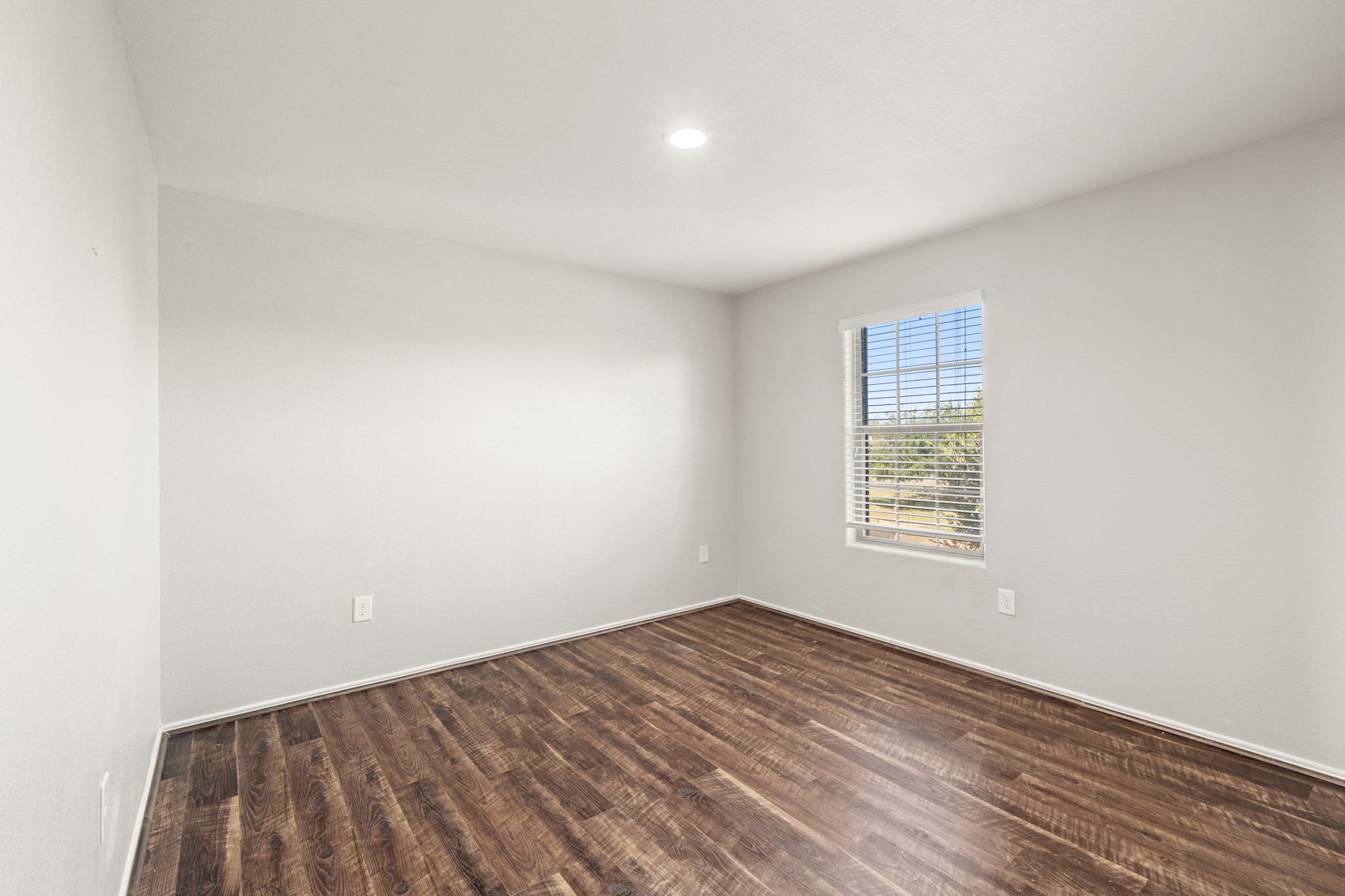 21359 Bandera Ranch Lane Katy, TX 77449 - Photo 23 of 31 an empty room with a window