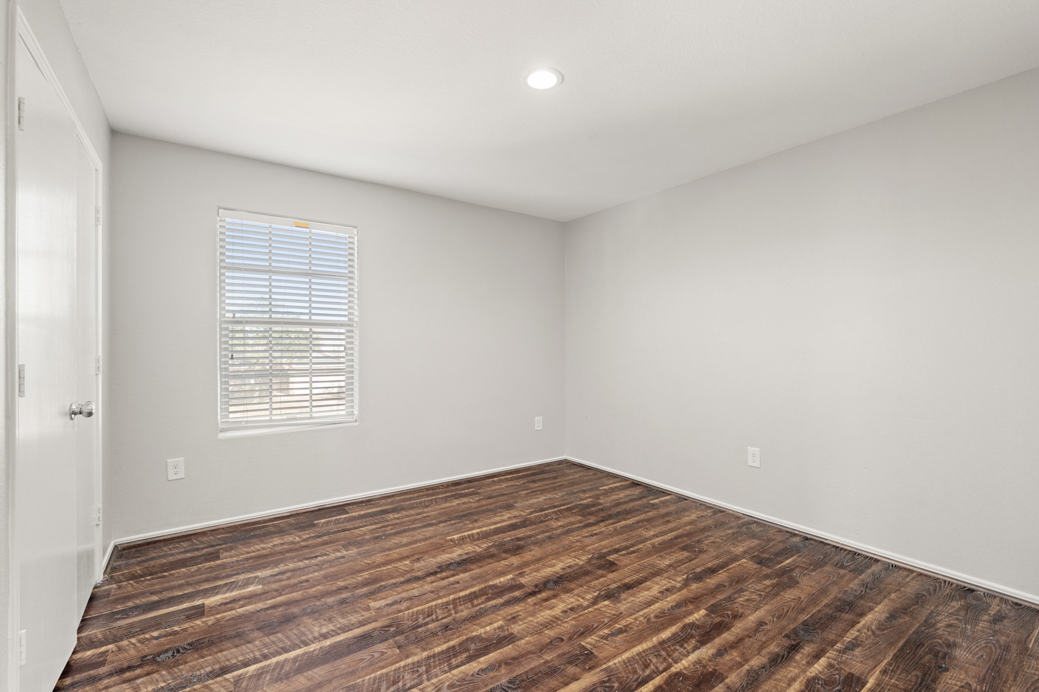 21359 Bandera Ranch Lane Katy, TX 77449 - Photo 25 of 31 a view of empty room with wooden floor and fan