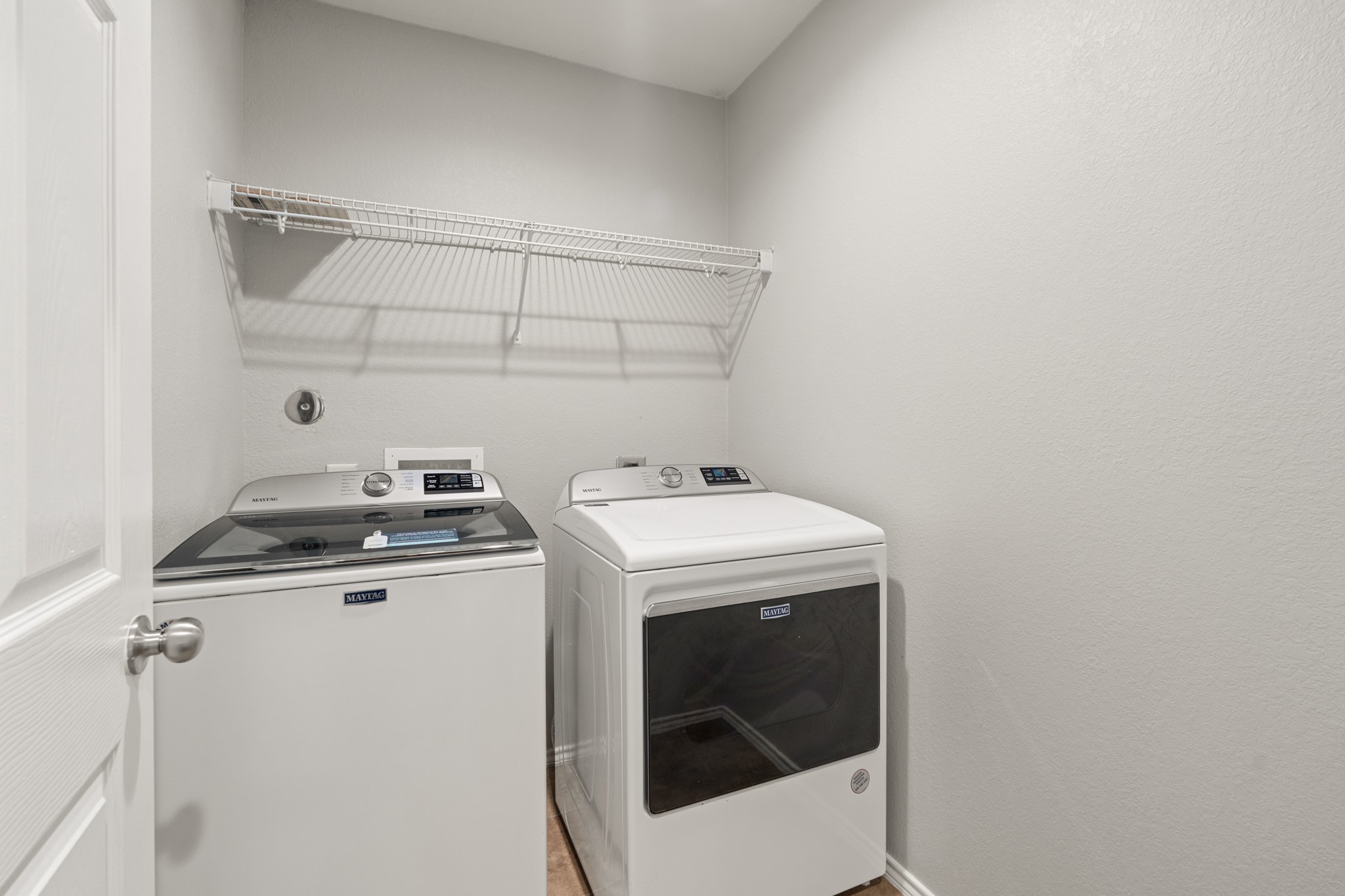 21359 Bandera Ranch Lane Katy, TX 77449 - Photo 26 of 31 a utility room with dryer and washer