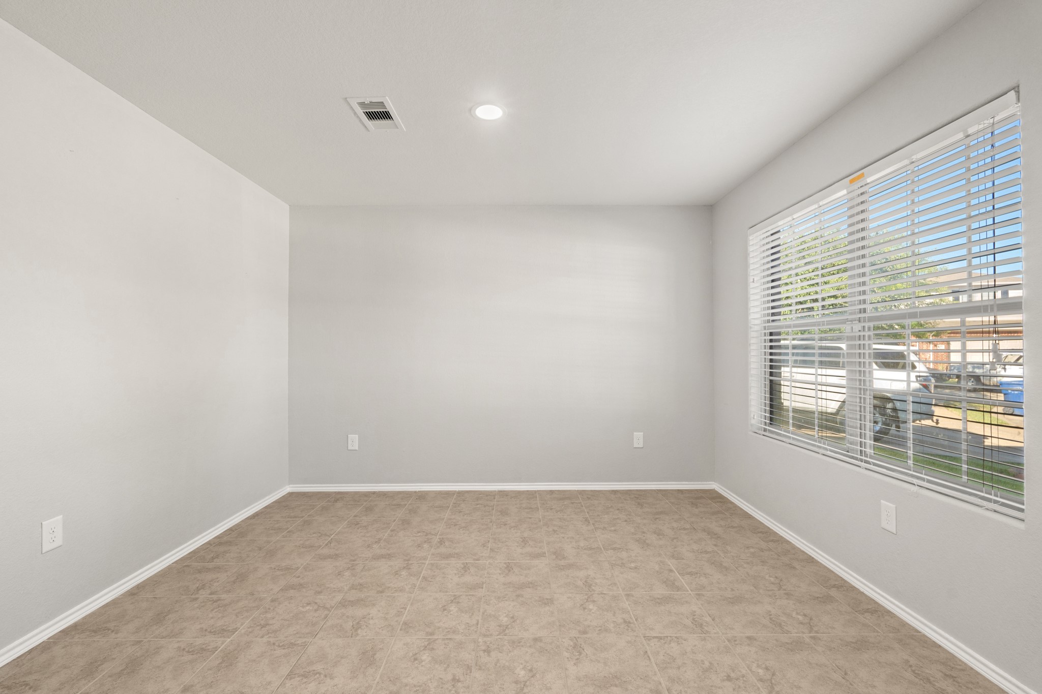 21359 Bandera Ranch Lane Katy, TX 77449 - Photo 6 of 31 an empty room with windows