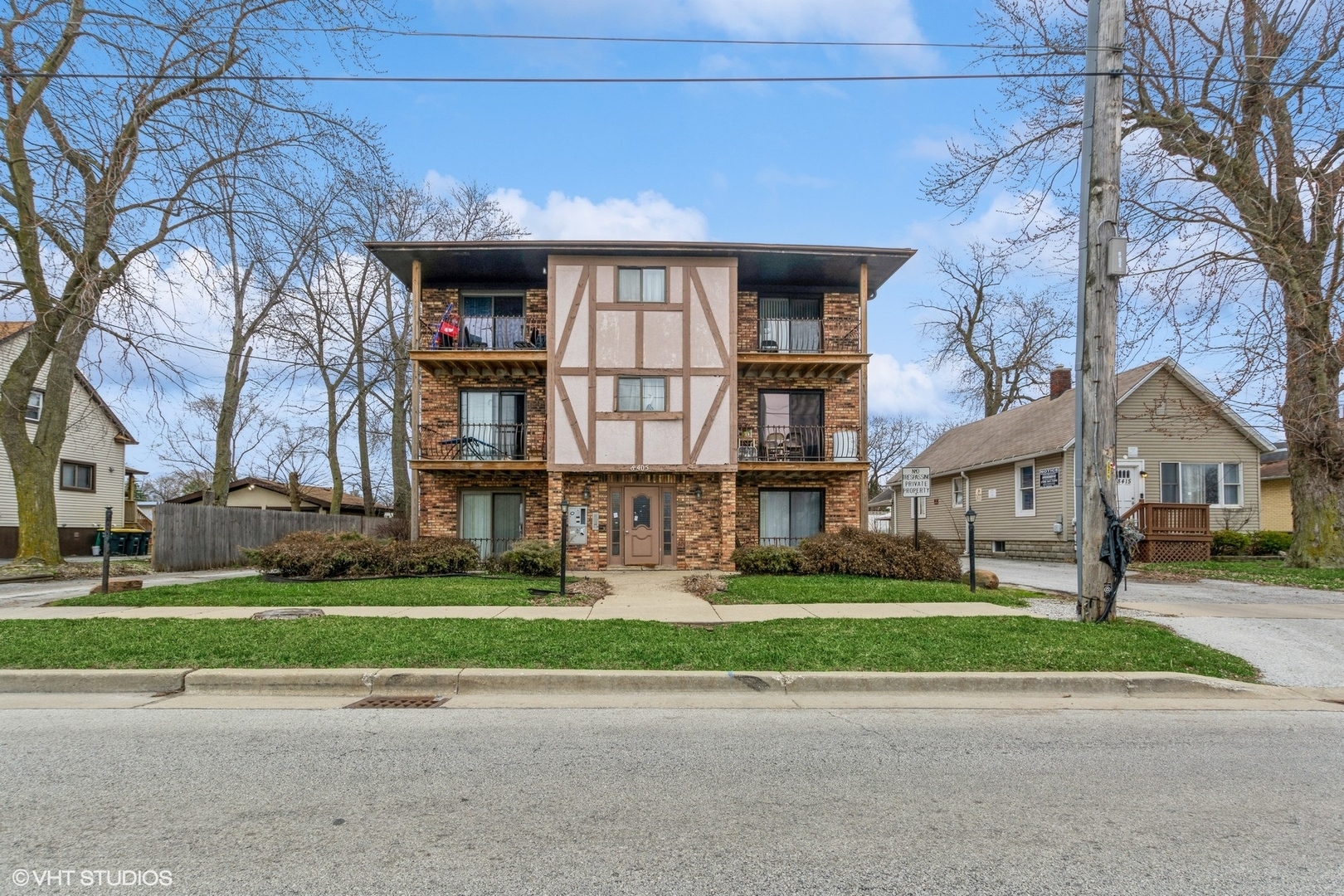 18405 Wentworth Avenue, Unit 1D Lansing, IL 60438 - Photo 6 of 6 a front view of building with yard and green space