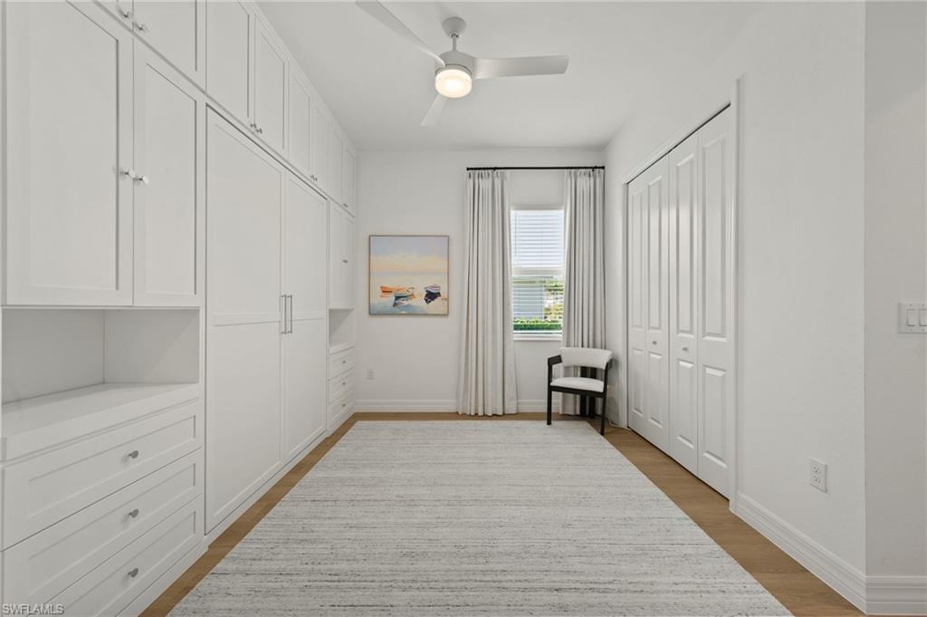 13654 Blue Bay Circle Fort Myers, FL 33913 - Photo 25 of 50 wooden floor in an empty room with a window