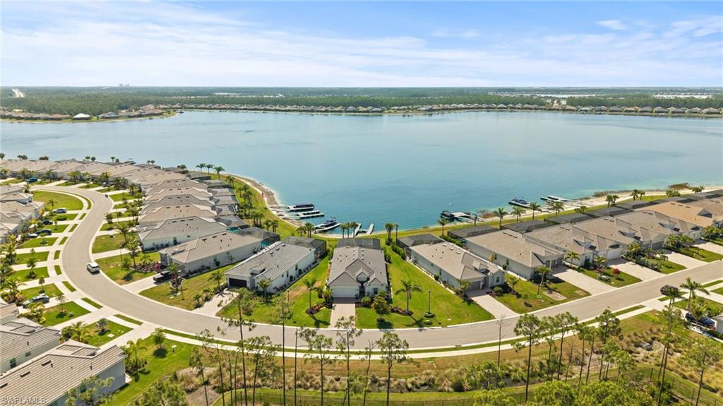 13654 Blue Bay Circle Fort Myers, FL 33913 - Photo 45 of 50 a view of a lake from a terrace