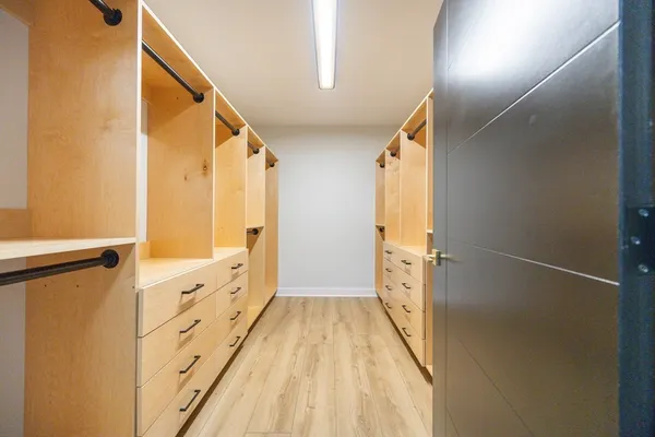 a bathroom with a double vanity sink and mirror