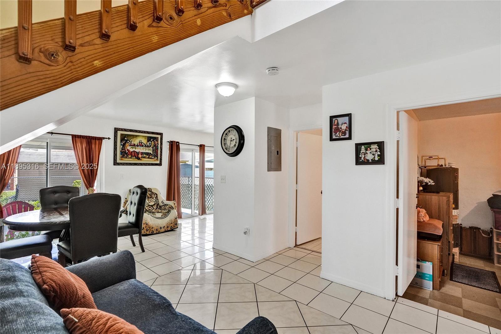 13780 Southwest 160th Terrace Miami, FL 33177 - Photo 13 of 42 a living room with furniture and a window