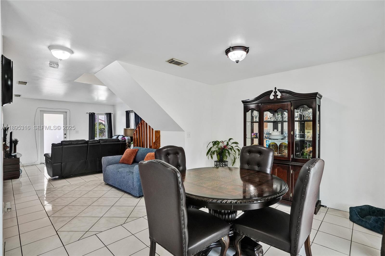 13780 Southwest 160th Terrace Miami, FL 33177 - Photo 16 of 42 a view of a dining room with furniture