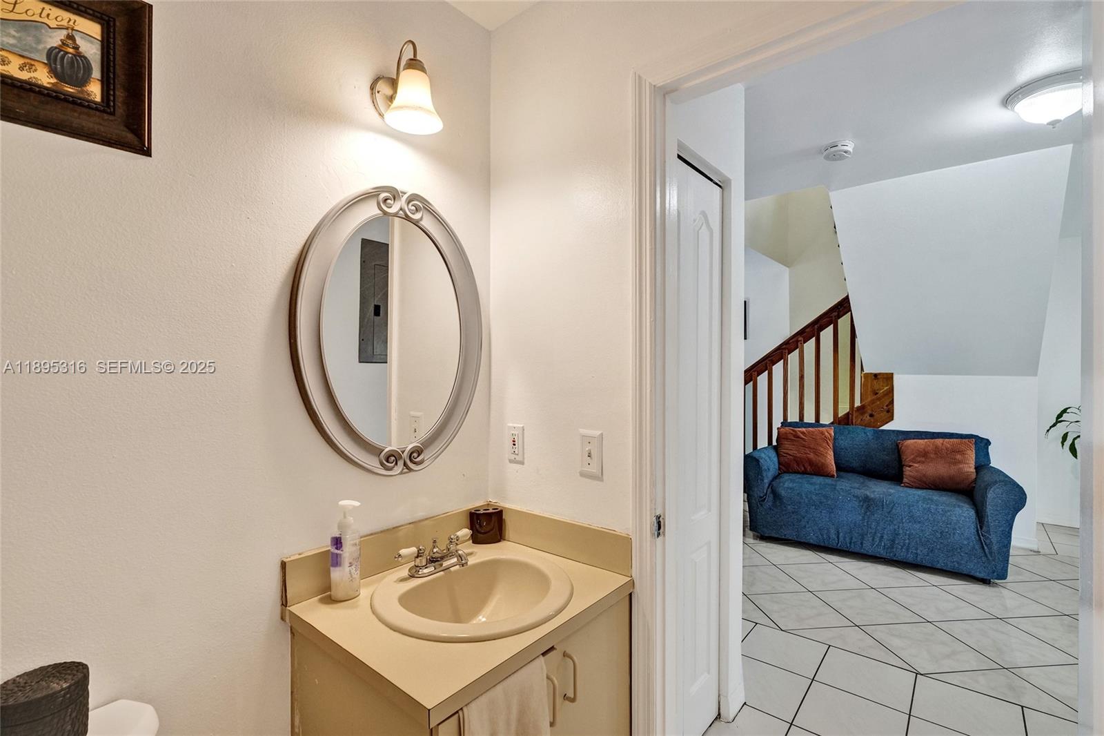 13780 Southwest 160th Terrace Miami, FL 33177 - Photo 28 of 42 a en suite bathroom with a sink and a mirror