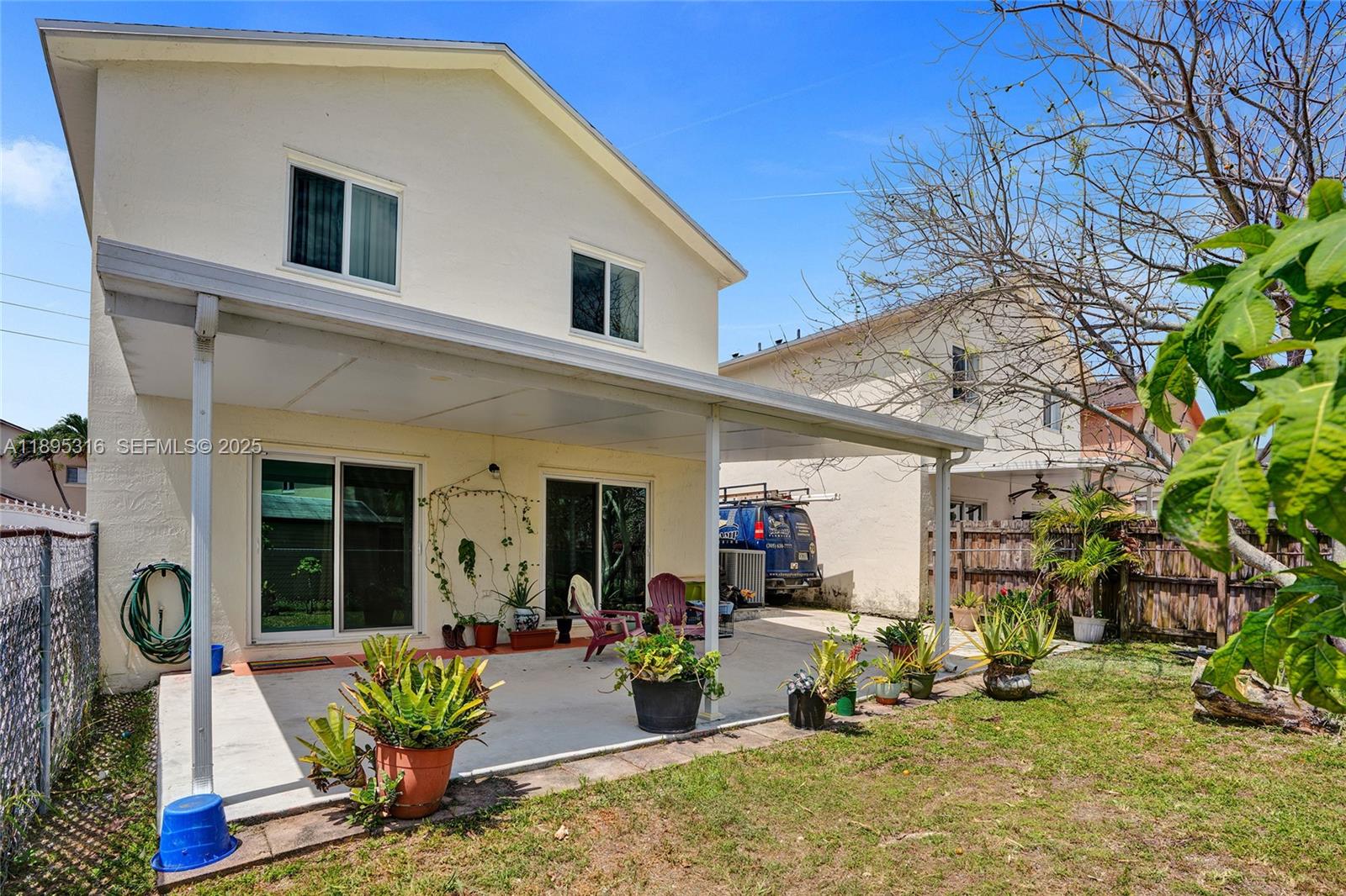 13780 Southwest 160th Terrace Miami, FL 33177 - Photo 36 of 42 front view of a house with a patio