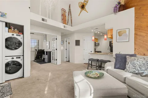 a view of a livingroom with furniture and view of living room