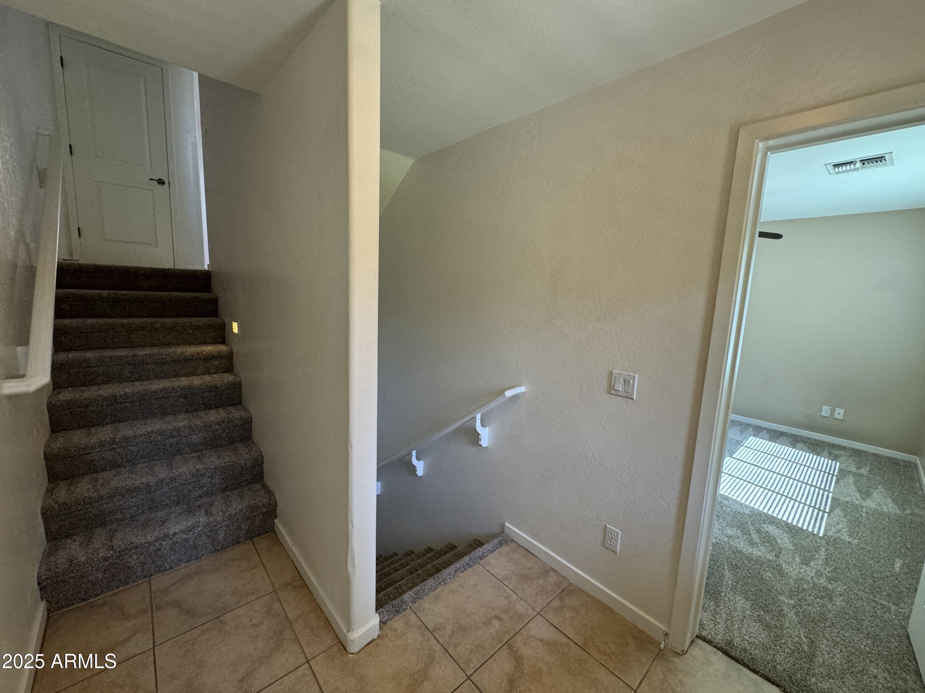 305 South Wilson Street, Unit 111 Tempe, AZ 85281 - Photo 43 of 48 a view of a hallway with stairs