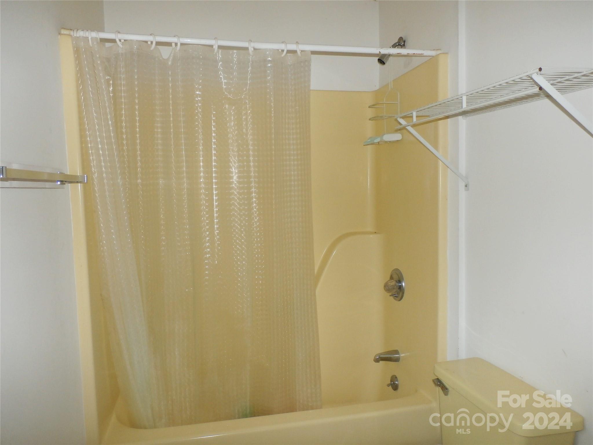288 Firetower Road Spruce Pine, NC 28777 - Photo 13 of 47 a bathroom with a shower