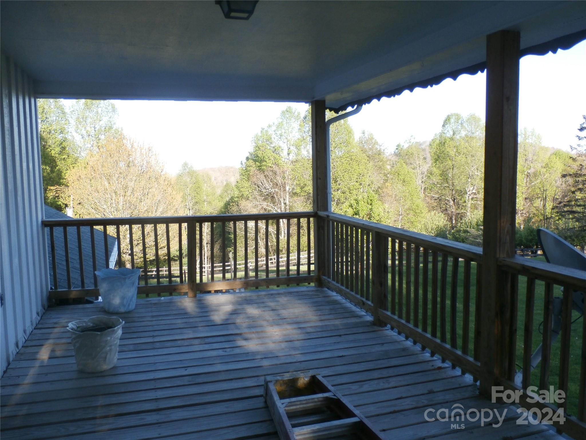 288 Firetower Road Spruce Pine, NC 28777 - Photo 17 of 47 a view of porch with wooden floor
