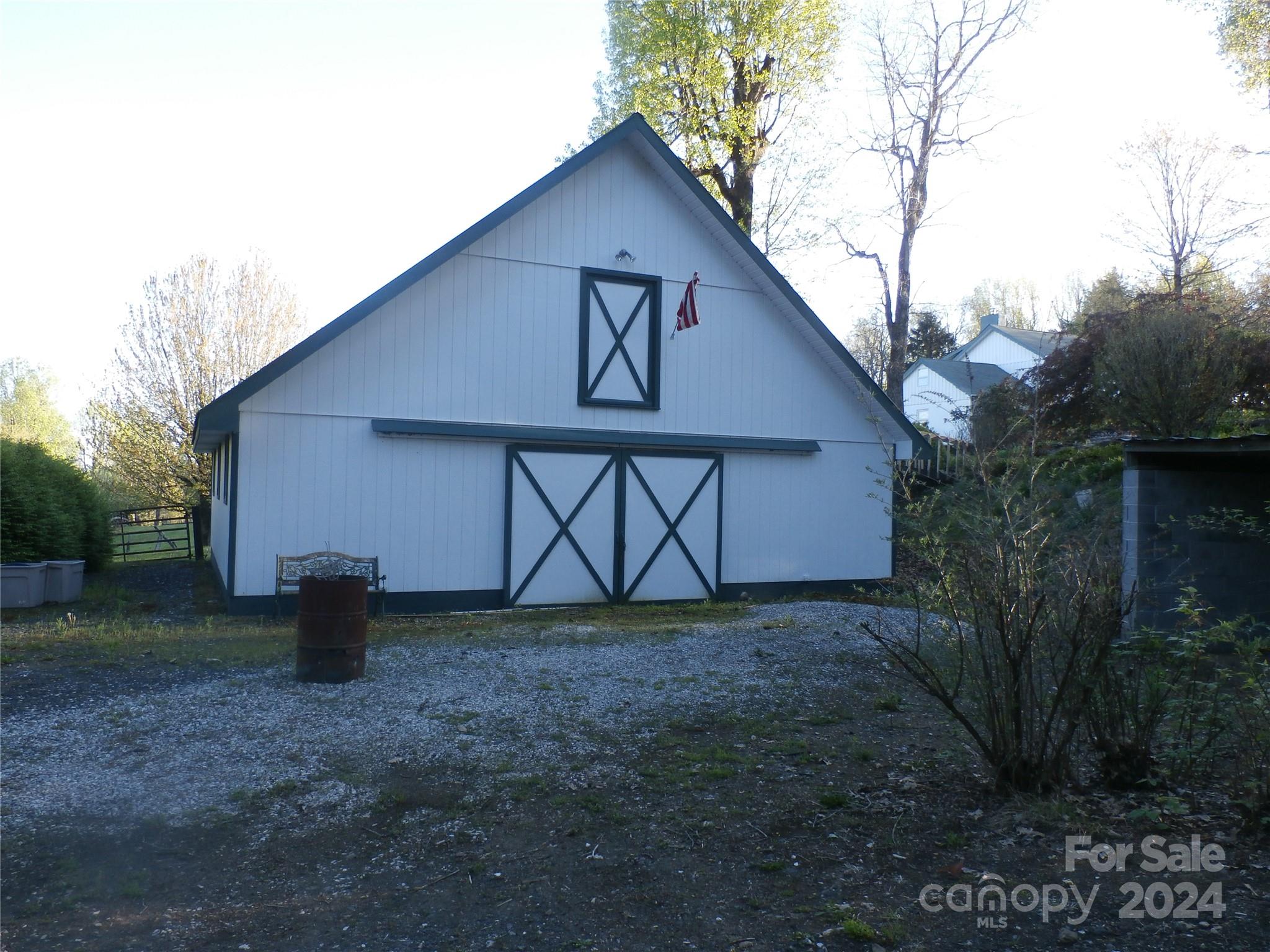 288 Firetower Road Spruce Pine, NC 28777 - Photo 24 of 47 a view of a house with backyard