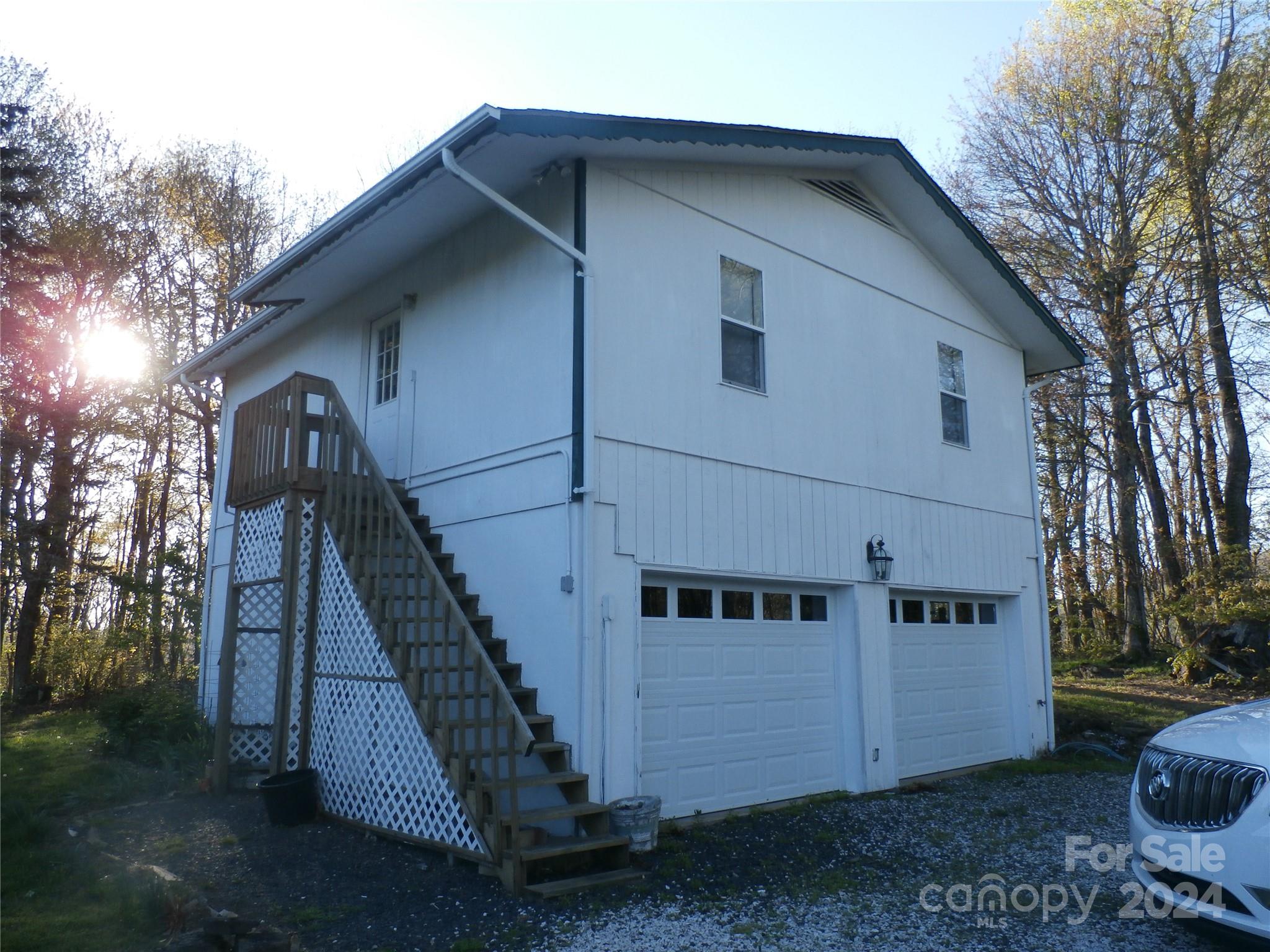 288 Firetower Road Spruce Pine, NC 28777 - Photo 38 of 47 a view of a house with a yard
