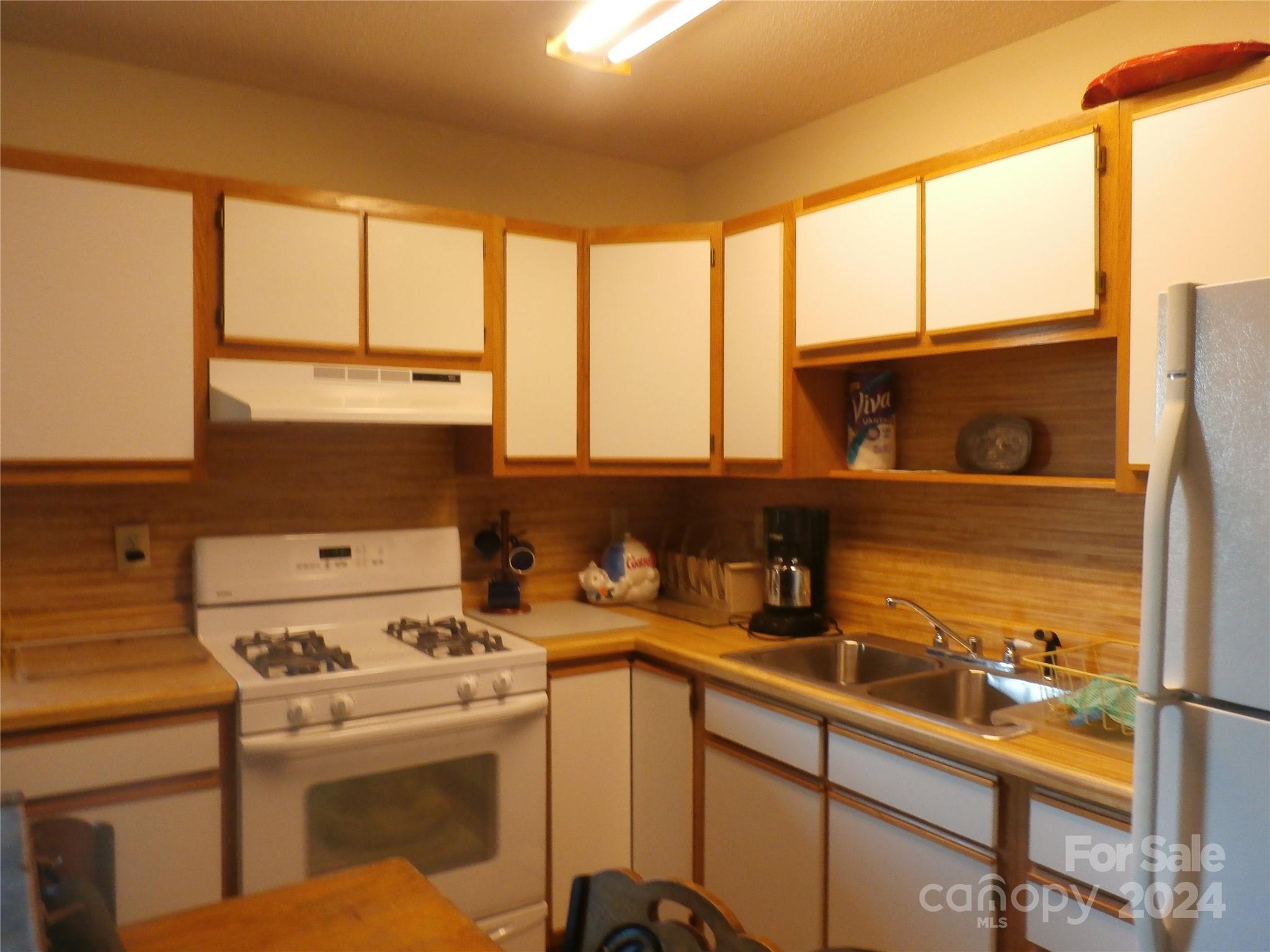 288 Firetower Road Spruce Pine, NC 28777 - Photo 40 of 47 a view of a kitchen with a large window