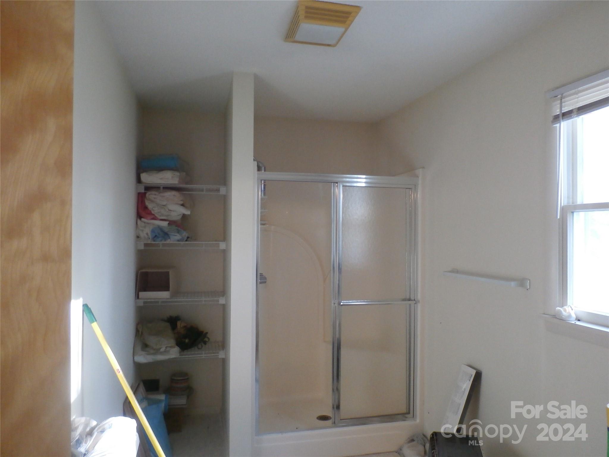 288 Firetower Road Spruce Pine, NC 28777 - Photo 47 of 47 a bathroom with a shower