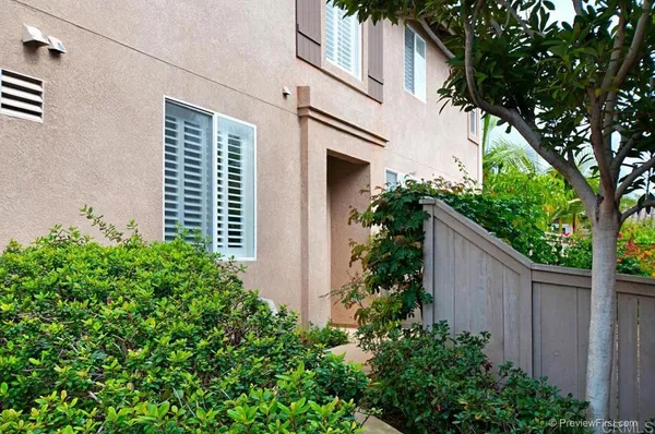 a plant that is in front of a house