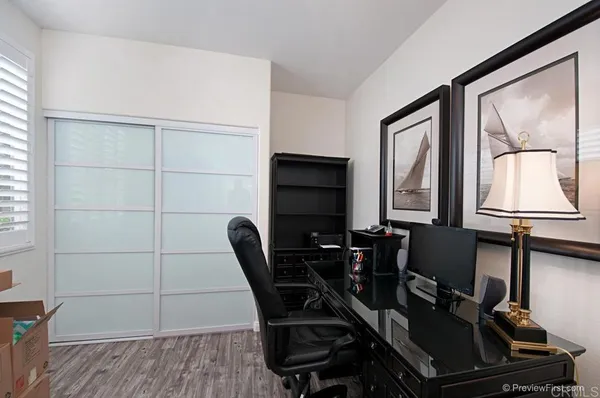 a view of a workspace with furniture