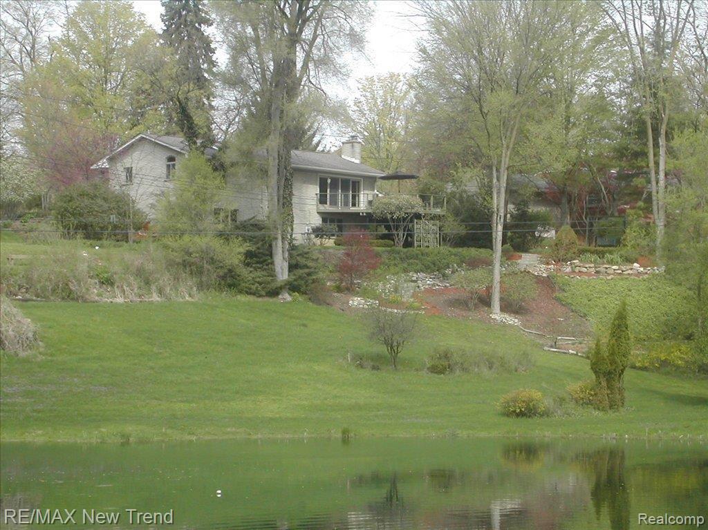 19550 Clement Road Northville, MI 48167 - Photo 16 of 20 Back of Home and Pond View