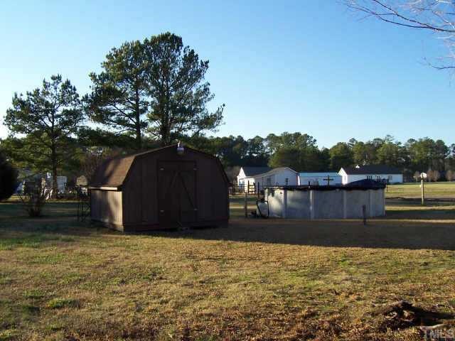 2595 Rains Crossroads Road, Unit D Selma, NC 27576 - Photo 8 of 12 View of Pool & Storage shed