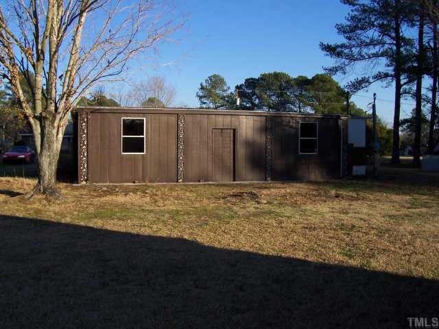 2595 Rains Crossroads Road, Unit D Selma, NC 27576 - Photo 10 of 12 View of Closed on patio on back of home currently used as storage.