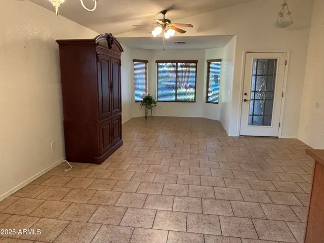 a view of an empty room and window