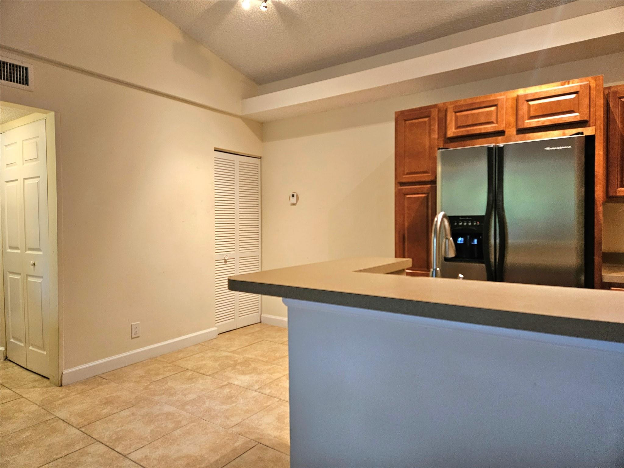 701 Lyons Road, Unit 13205 Coconut Creek, FL 33063 - Photo 2 of 37 a view of a storage & utility room