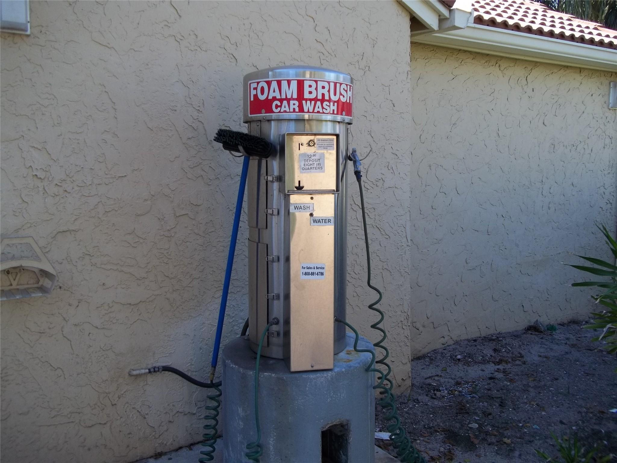 701 Lyons Road, Unit 13205 Coconut Creek, FL 33063 - Photo 32 of 37 a sign that is on the side of a building