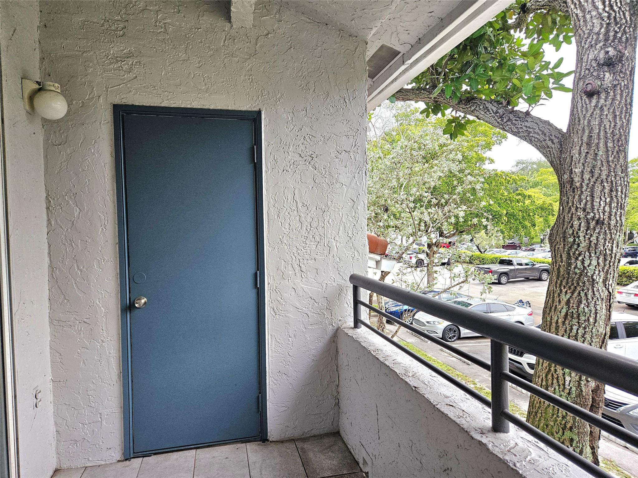 701 Lyons Road, Unit 13205 Coconut Creek, FL 33063 - Photo 10 of 37 a view of outdoor space and balcony