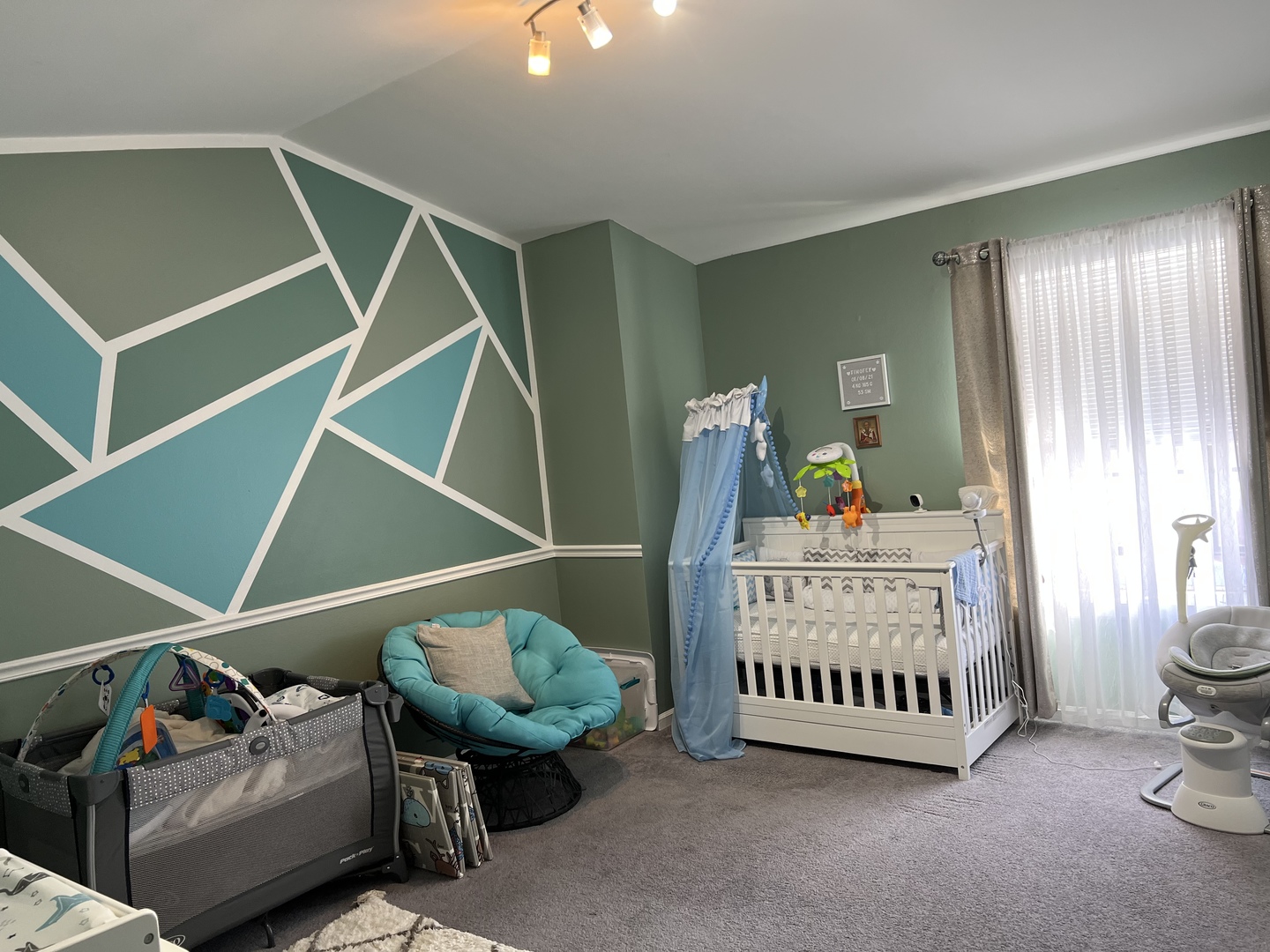 1931 North Hicks Road, Unit 211 Palatine, IL 60074 - Photo 15 of 18 a view of livingroom with furniture and toys
